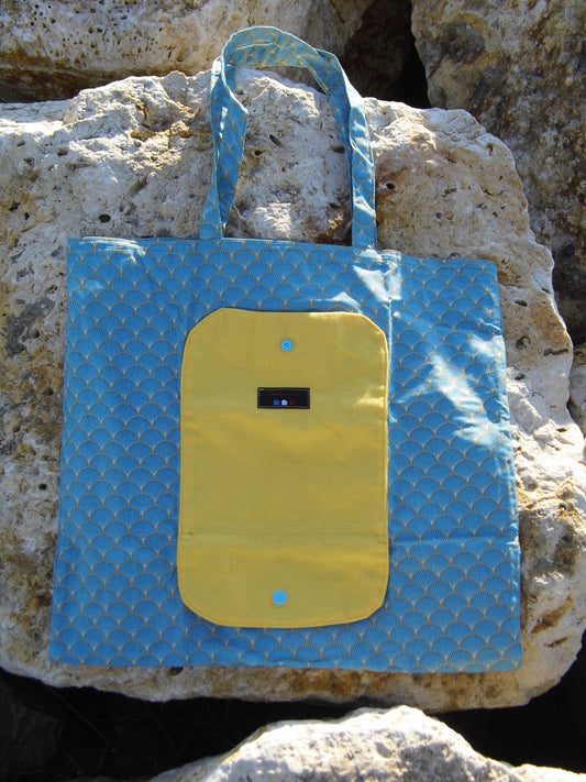 Sac pliable jaune et bleu