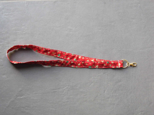 Dragonne de noël fond rouge avec des étoiles vertes et jaunes